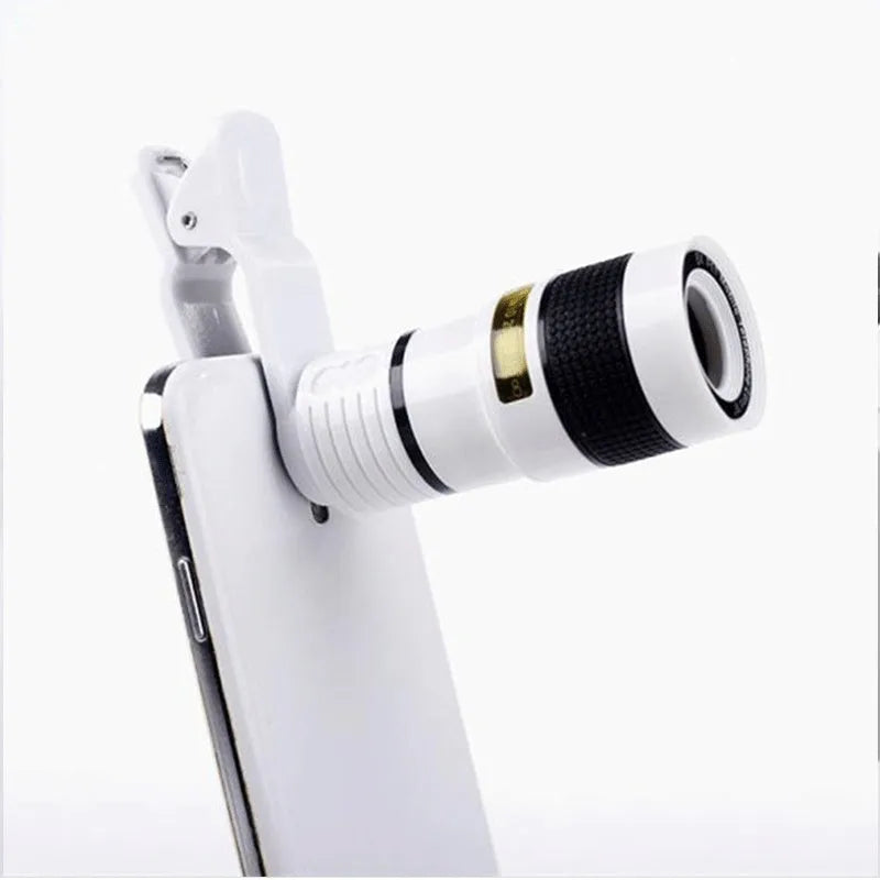 12X magnification phone telescope lens with mounting clip on a black smartphone