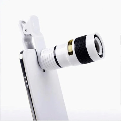12X magnification phone telescope lens with mounting clip on a black smartphone