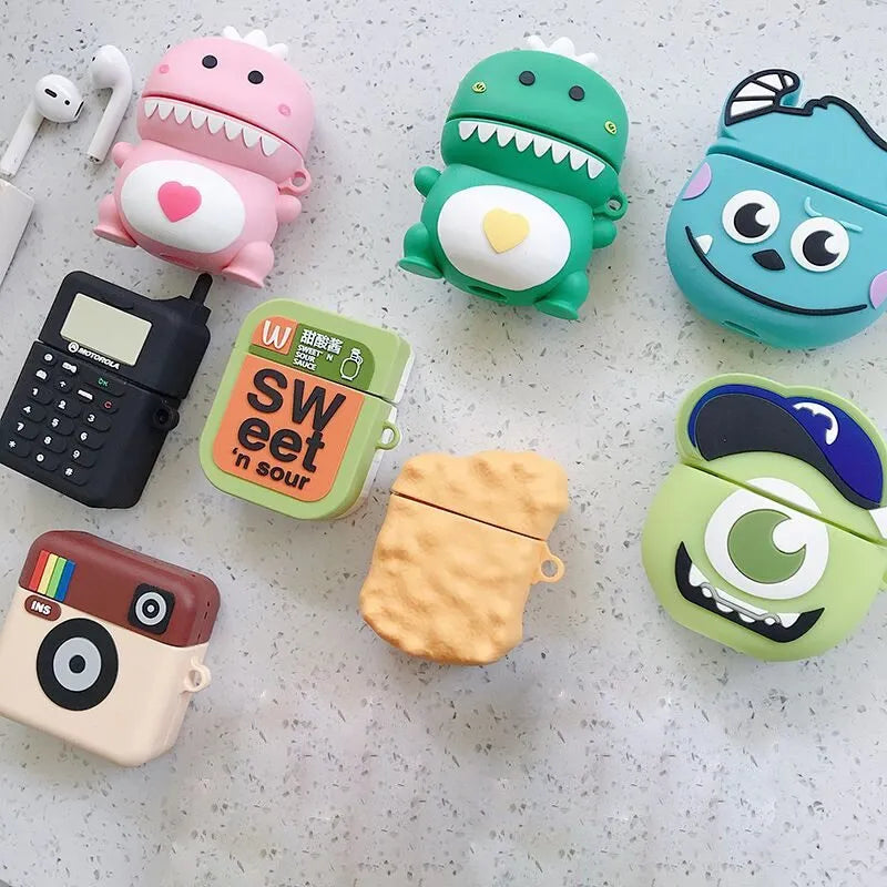 Green silicone AirPods case with a cartoon animal design, compatible with AirPods 1 and 2.