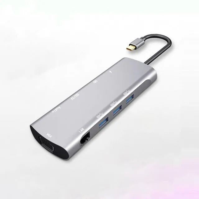 Grey aluminium USB-C docking station with HDMI, VGA, USB and charging ports