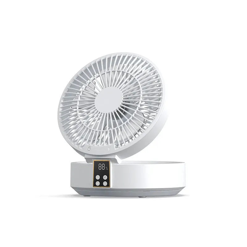 White portable folding desk fan with remote control and warm night light on a table