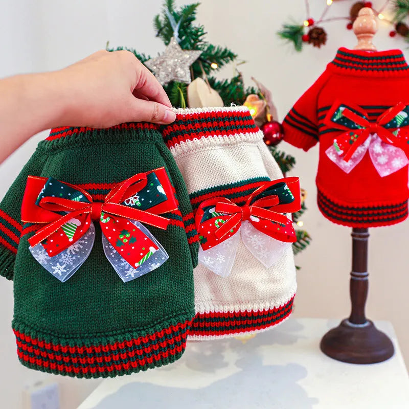 Red and green dog Christmas jumpers on a size chart showing XS, S, M, L, XL for pet weights 1kg to 9kg