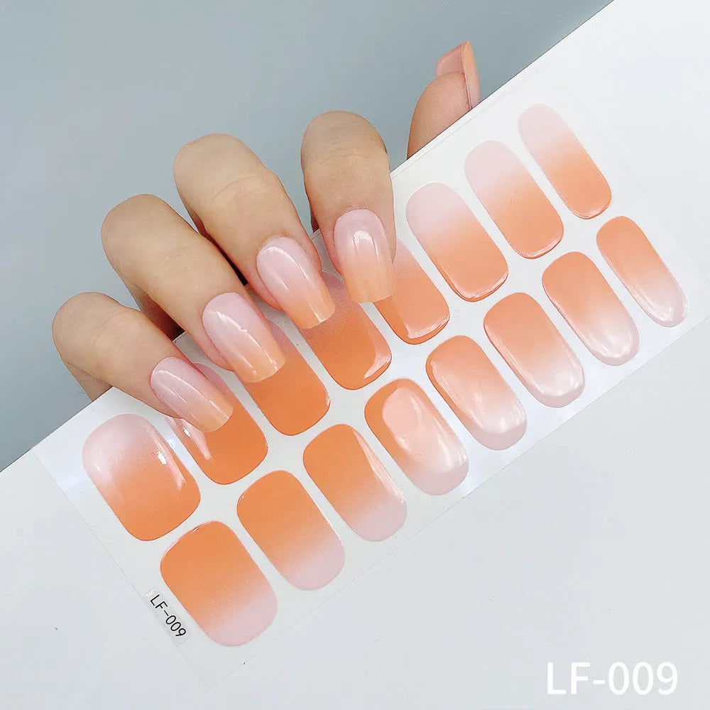 Sheet of 16 solid colour nail art sticker designs including cross, rose, and leopard print patterns.