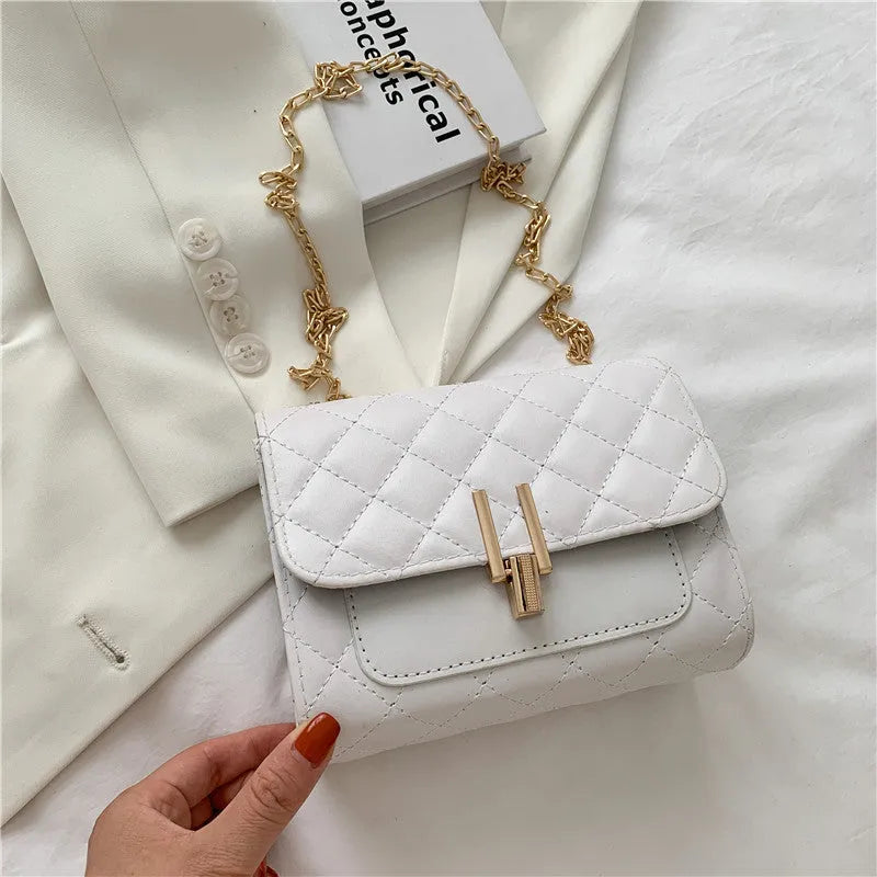 Women's PU crossbody bag with diamond lattice chain strap in minimalist solid colour design