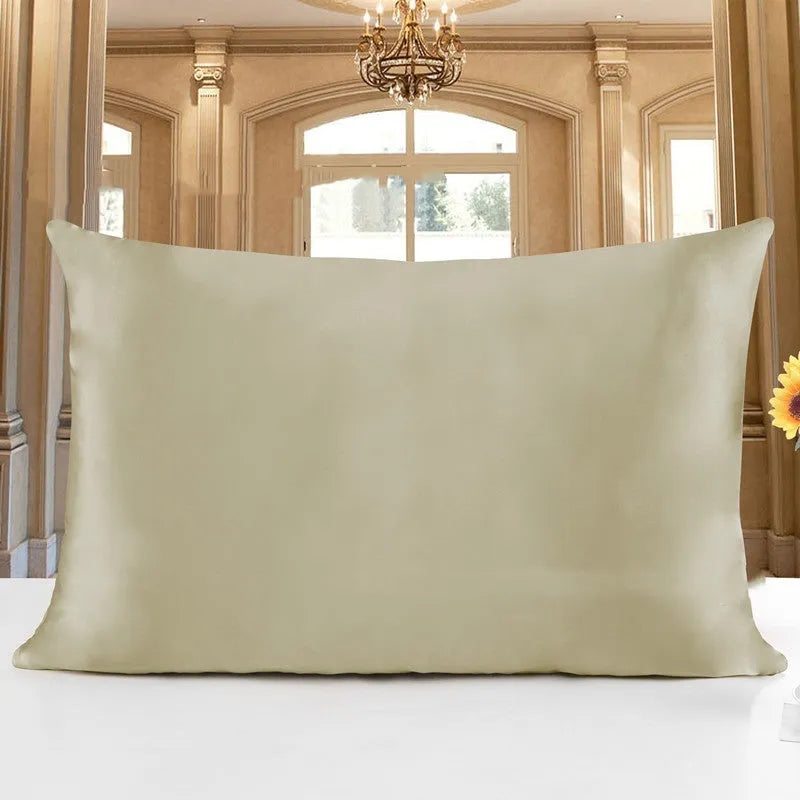 19 M double-sided silk pillowcase in apricot colour showing smooth texture and hem detail.