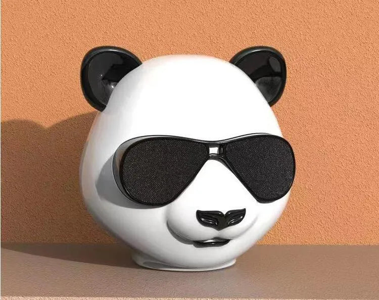 Classic style portable mini Bluetooth speaker on a table