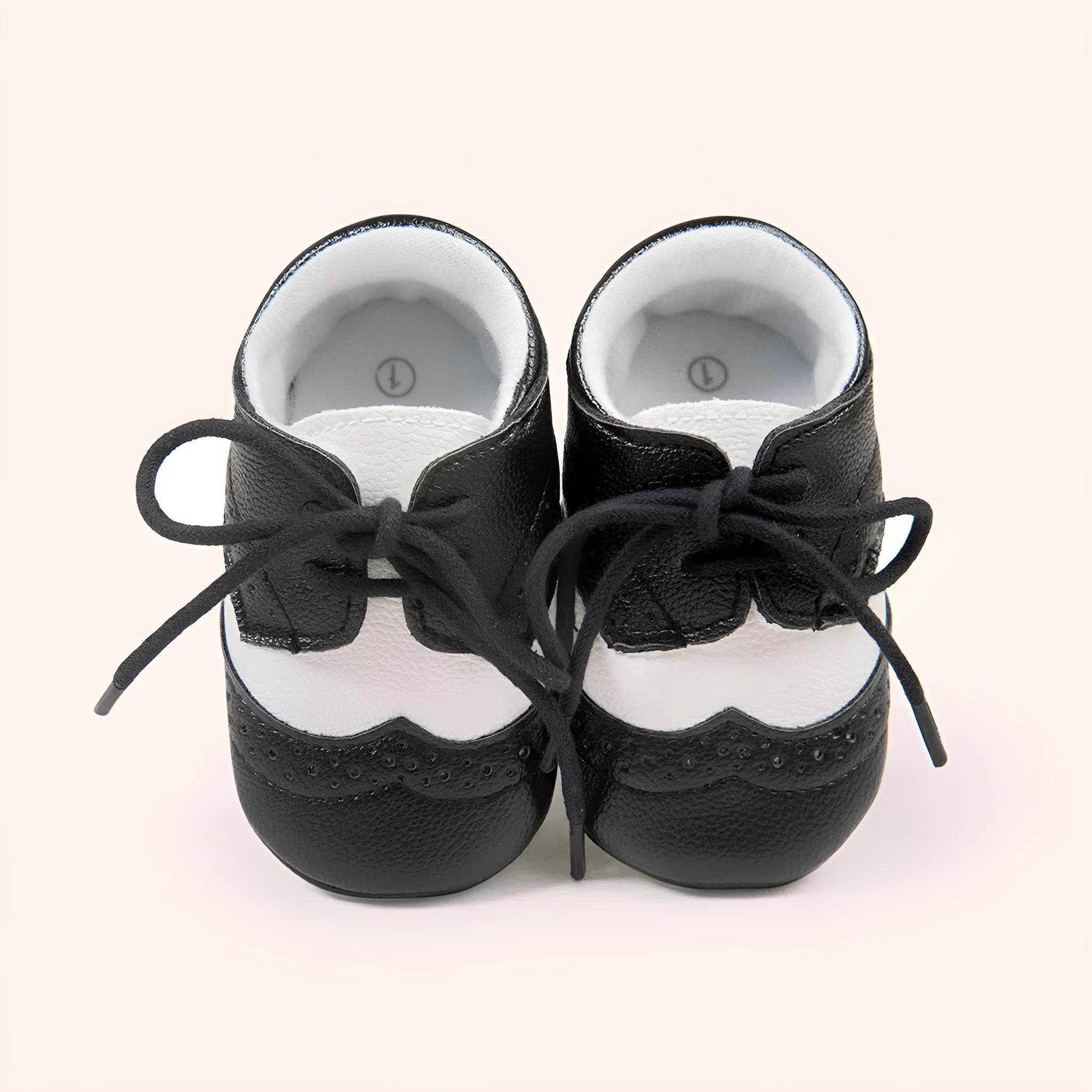 Men's vintage style soft-soled baby walking shoes in synthetic leather, showing colour options and sizing for 0-12 month infants