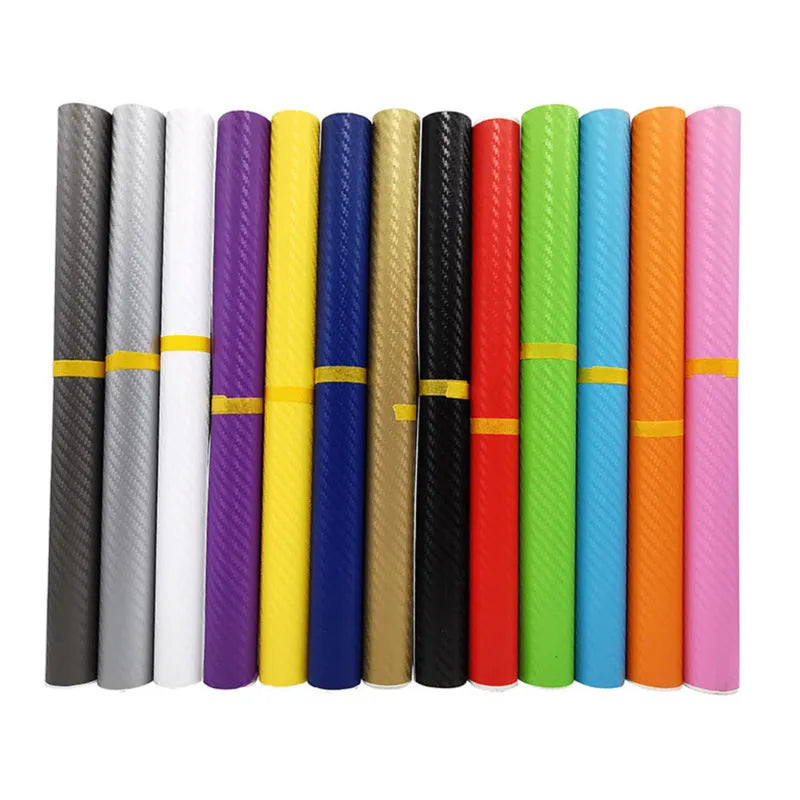 Roll of 3D carbon fibre patterned car sticker in one of eight colours, showing textured black and silver weave design