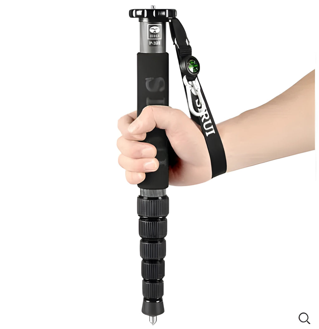 Black carbon fibre SLR camera monopod extended to full 1540mm height with six telescopic sections