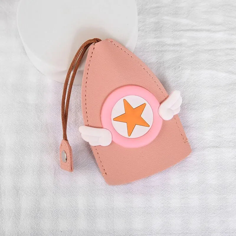 Cartoon pull-out car key case in PU leather with colourful designs measuring 14 x 7.5 cm