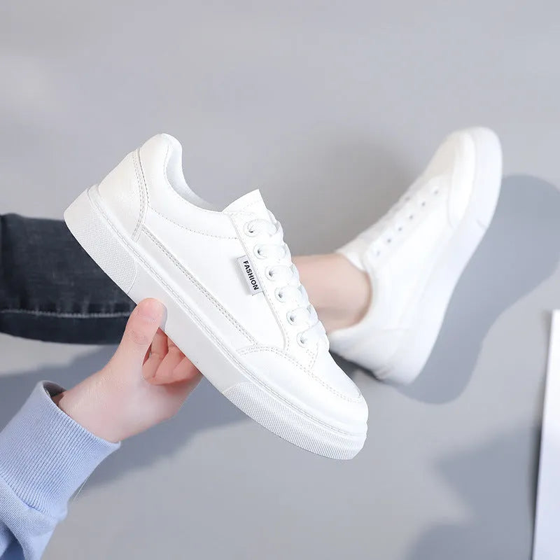 Korean style low-top sneakers in white and brown colours with artificial PU upper