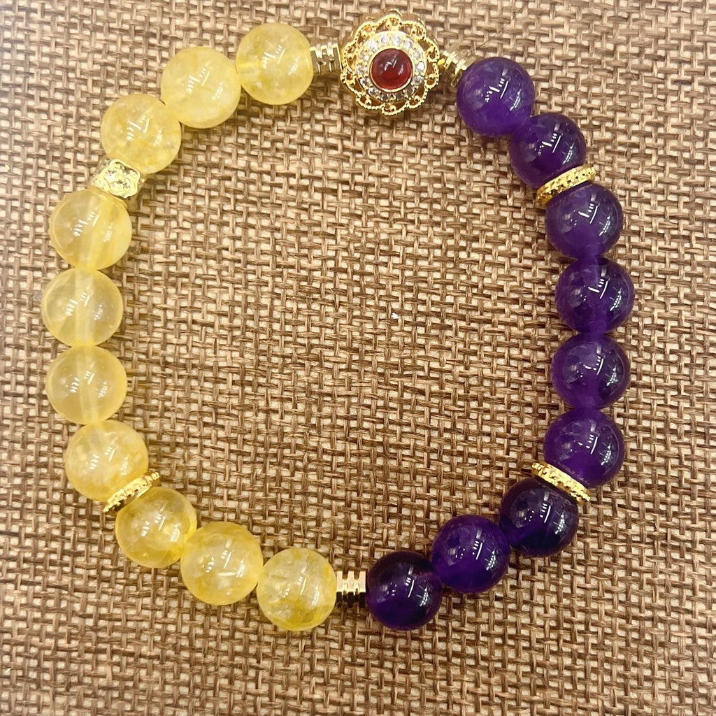 Handmade women's crystal bracelet with yellow and purple amethyst stones