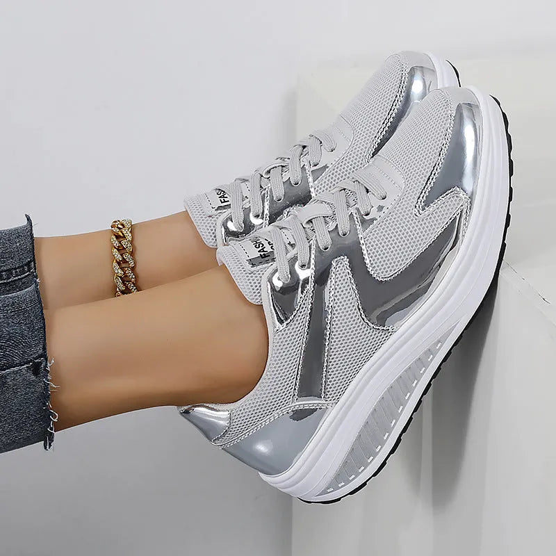 Women's gold platform shoes with mesh upper, round toe, and cross-strap detail
