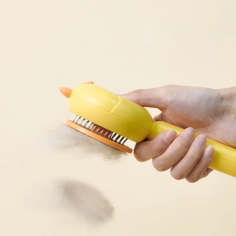 Self-cleaning pet grooming brush in purple, with stainless steel bristles and a one-button release.