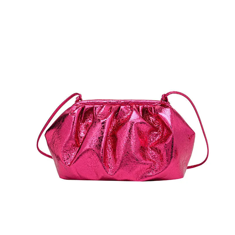 Simple hair clip shoulder crossbody bag in shell shape with sewing line details, shown in rose red colour.