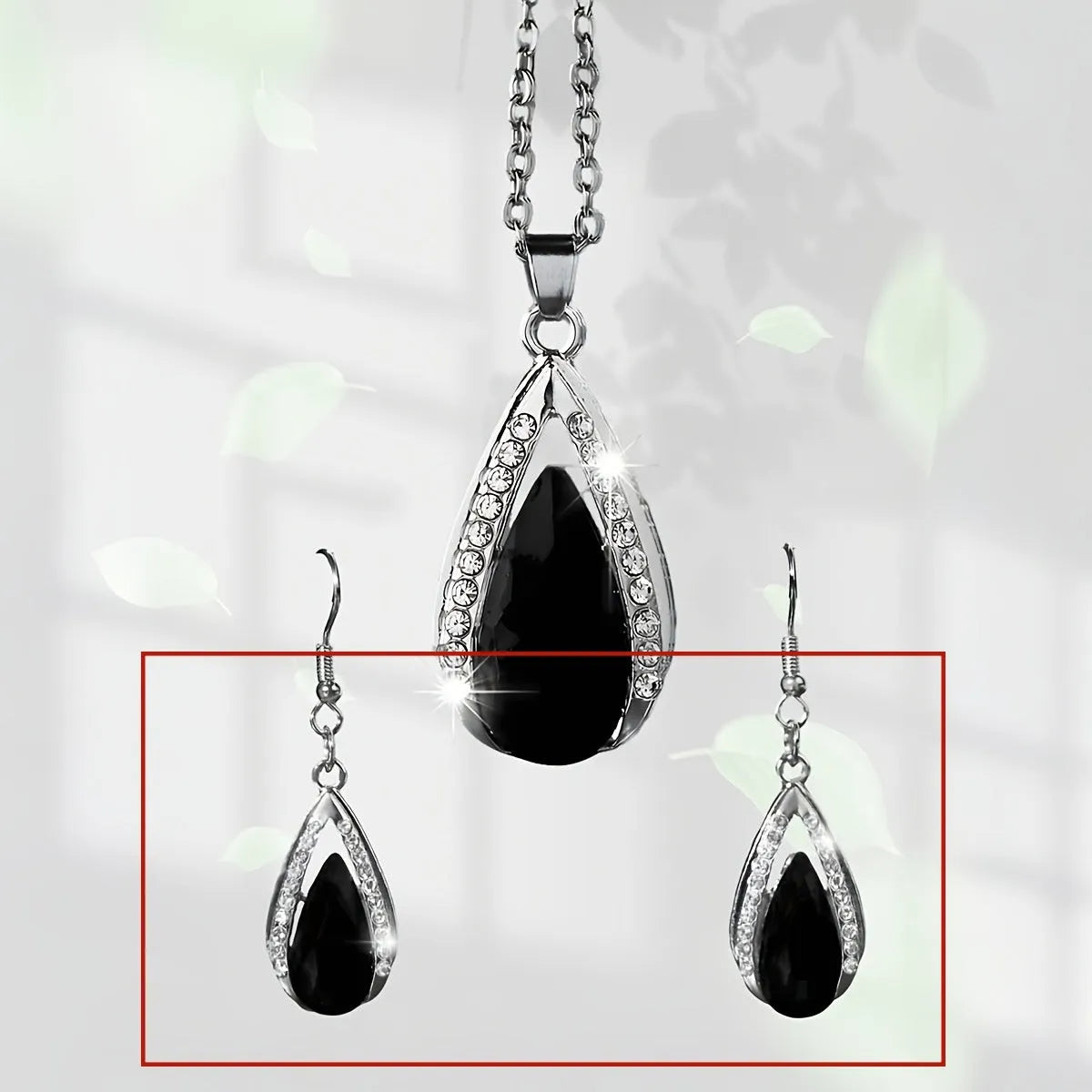 Black and red alloy necklace and earrings set with teardrop glass pendants