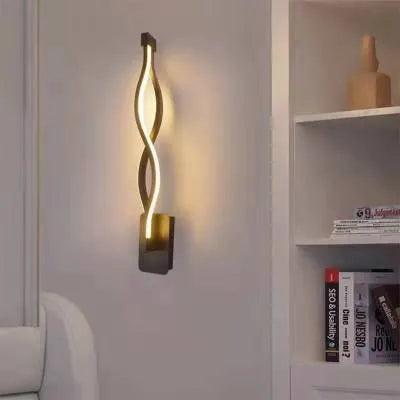 Minimalist Nordic-style LED wall lamp mounted on a wall, shown in a black finish with a soft glow.