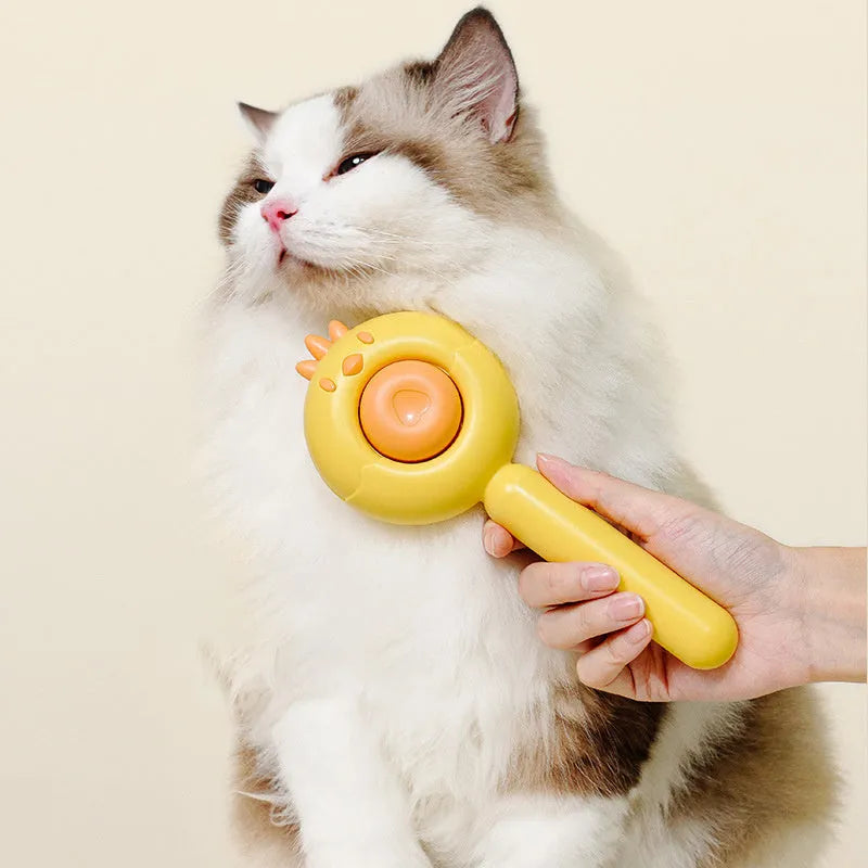 Self-cleaning pet grooming brush in purple, with stainless steel bristles and a one-button release.