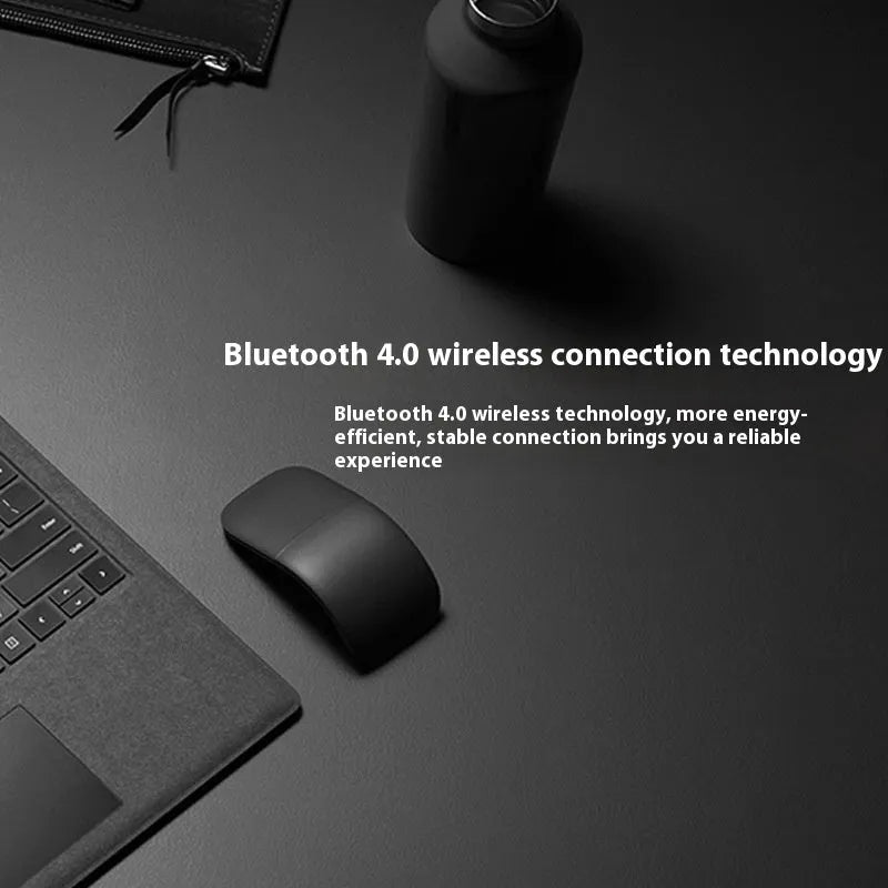 Folded black Bluetooth wireless mouse showing compact 131.2mm length and touch control surface