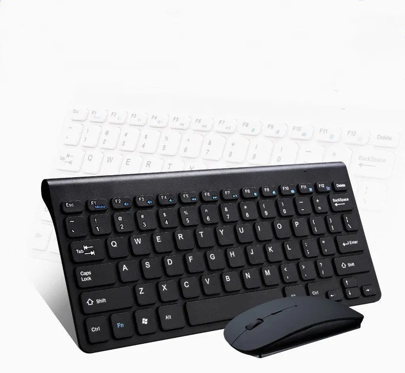 Black wireless keyboard and mouse set with 4G receiver on wooden desk