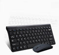 Black wireless keyboard and mouse set with 4G receiver on wooden desk