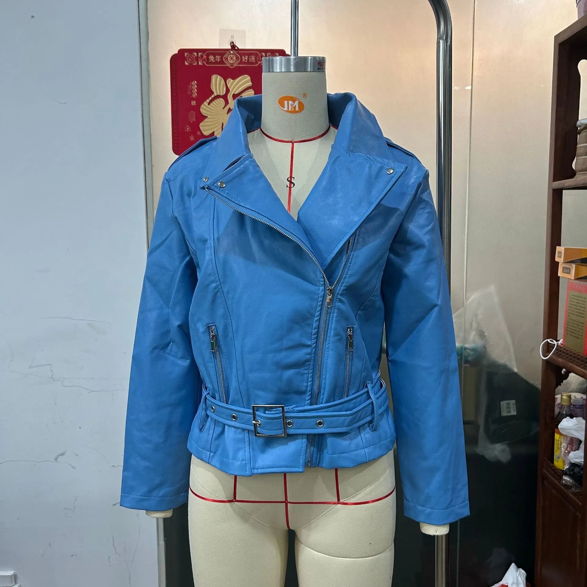 Women's punk short belt lapel jacket in polyester leather with drawstring waist and Peter Pan collar