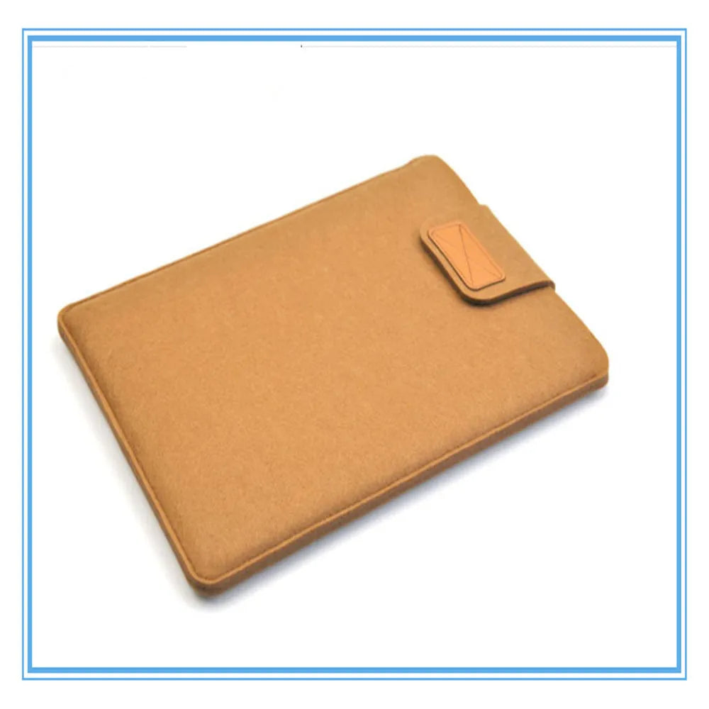 Frosted woven laptop bag with plush felt interior shown open to reveal corner protectors and organised storage
