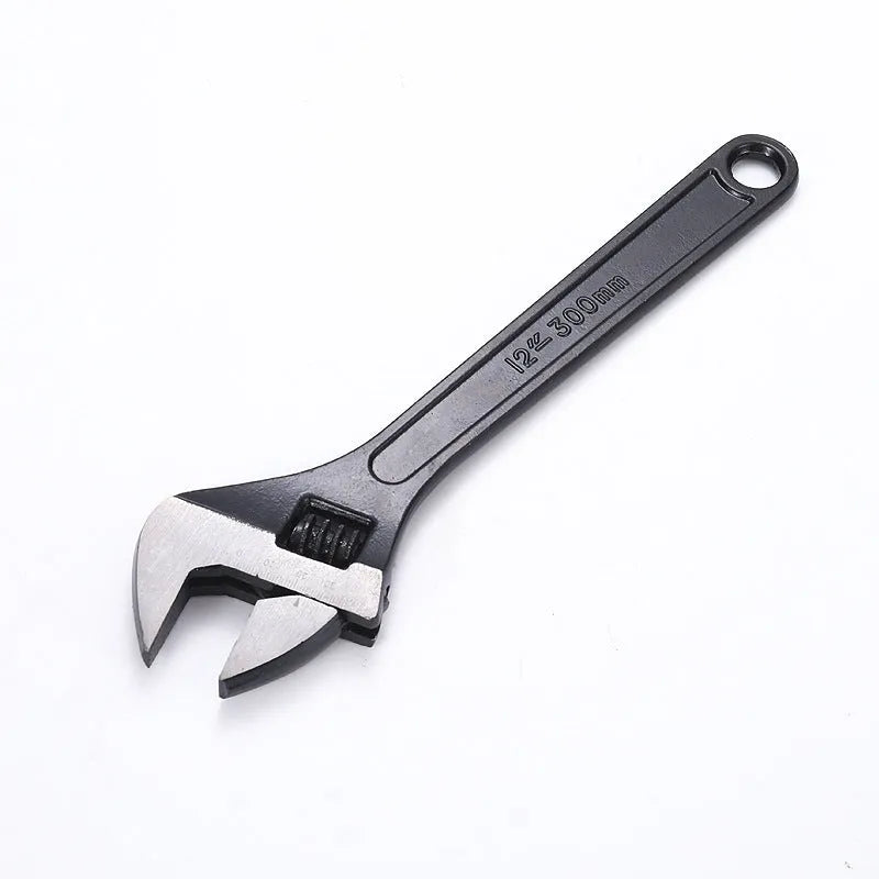 Stainless steel adjustable open-end wrench with blackened finish showing adjustment mechanism and four size options