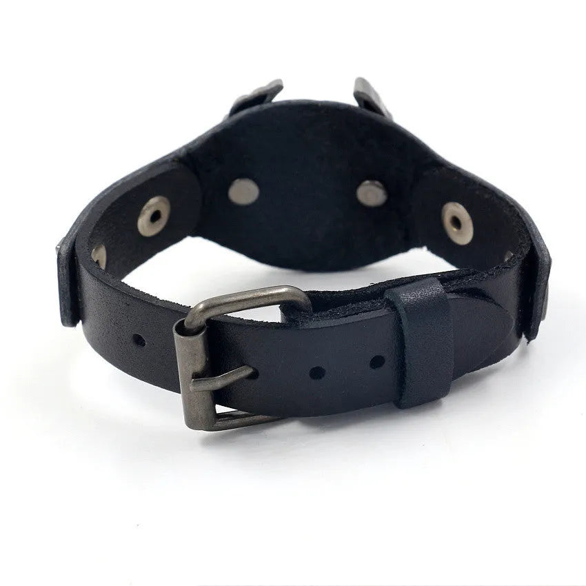 Black geometric bracelet with an alloy eagle watch-buttom on a leather strap.