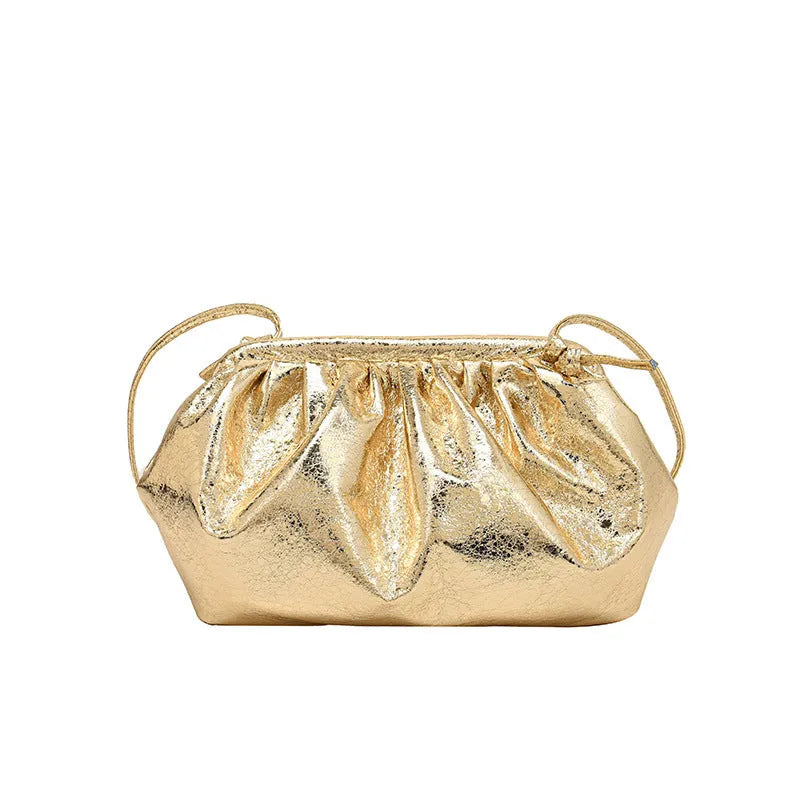 Simple hair clip shoulder crossbody bag in shell shape with sewing line details, shown in rose red colour.