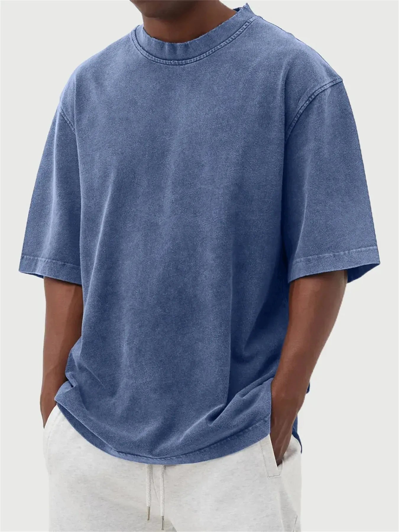 Men's stone washed distressed pullover t-shirt in loose fit with half sleeves available in eight colours