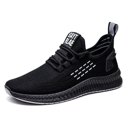 Men's black casual sports shoes with white stripes and a cross-strap detail over a Flying Weave upper.