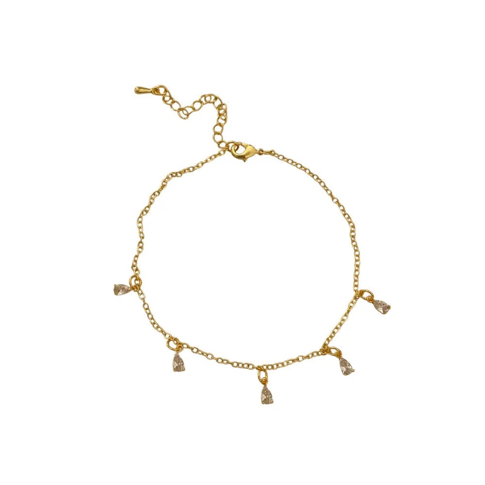 Women's zircon jewellery set with geometric meteor shower necklace, matching earrings, and anklet.
