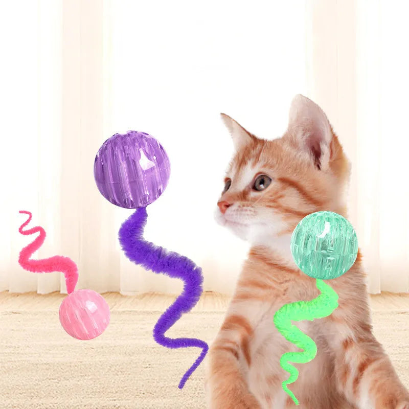 Interactive cat ball toy with worm-like plush tail in green, pink or purple colours
