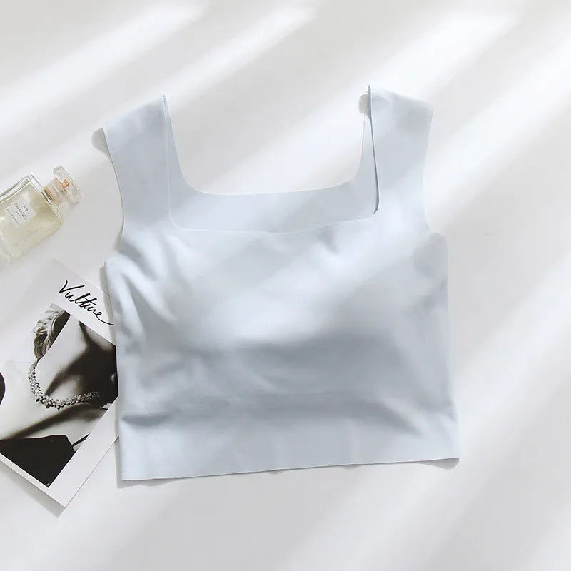 Women's non-marking sling vest with chest pad in nylon fabric, shown in light blue colour
