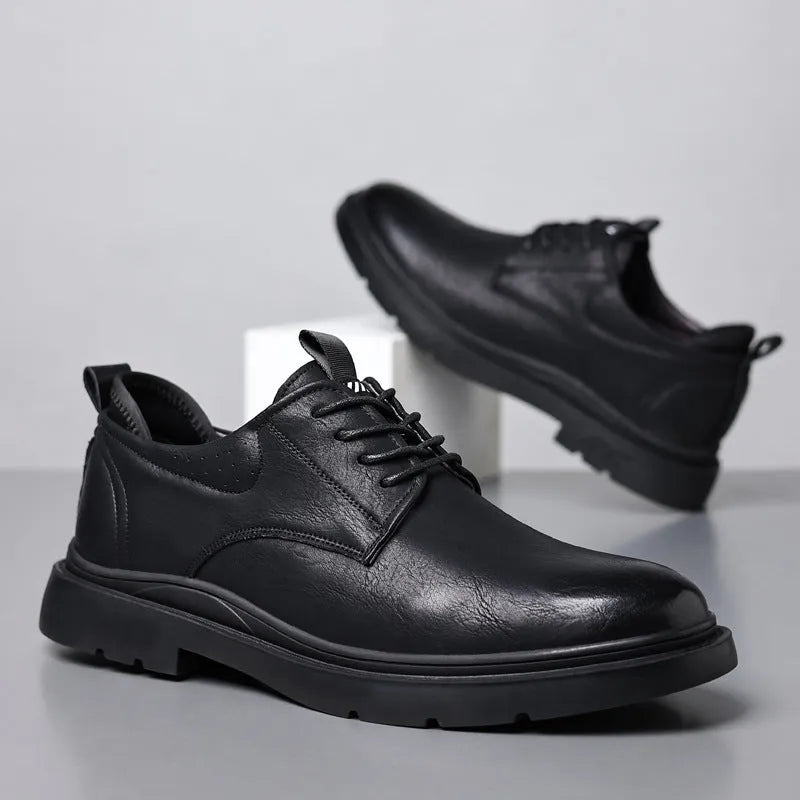 Men's black and brown leather casual sneaker with rubber sole and decorative sewing line detailing