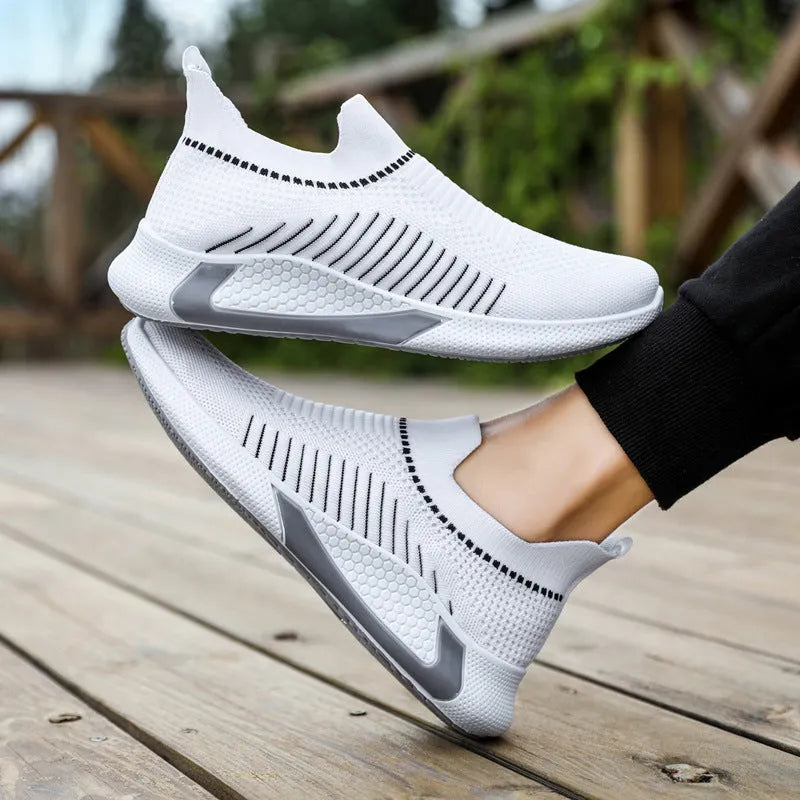 Men's mesh slip-on sneakers with striped design and front lace-up in black colour