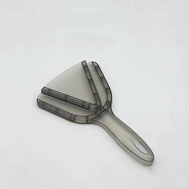Red adjustable telescopic can and bottle opener with non-slip grip on kitchen counter