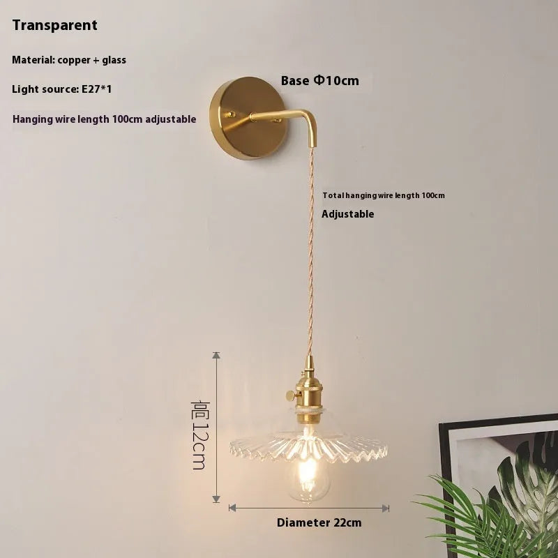 Copper retro lotus wall lamp with glass shade in amber colour variation