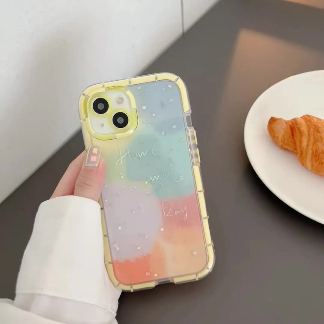 Slim minimalist silicone phone case for iPhone 14 with a yellow edge on a contrasting background.