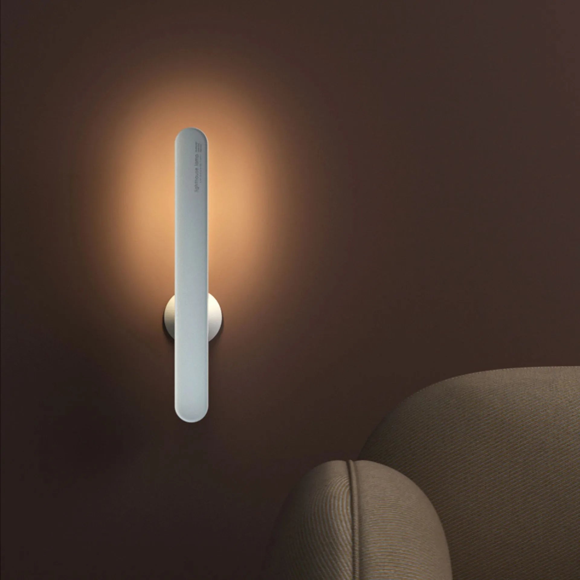 Geometric table lamp with magnetic suction base showing white and khaki colour options