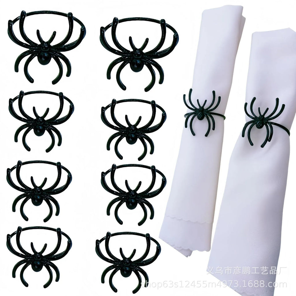 Six black spider-shaped alloy napkin rings for Halloween table decoration