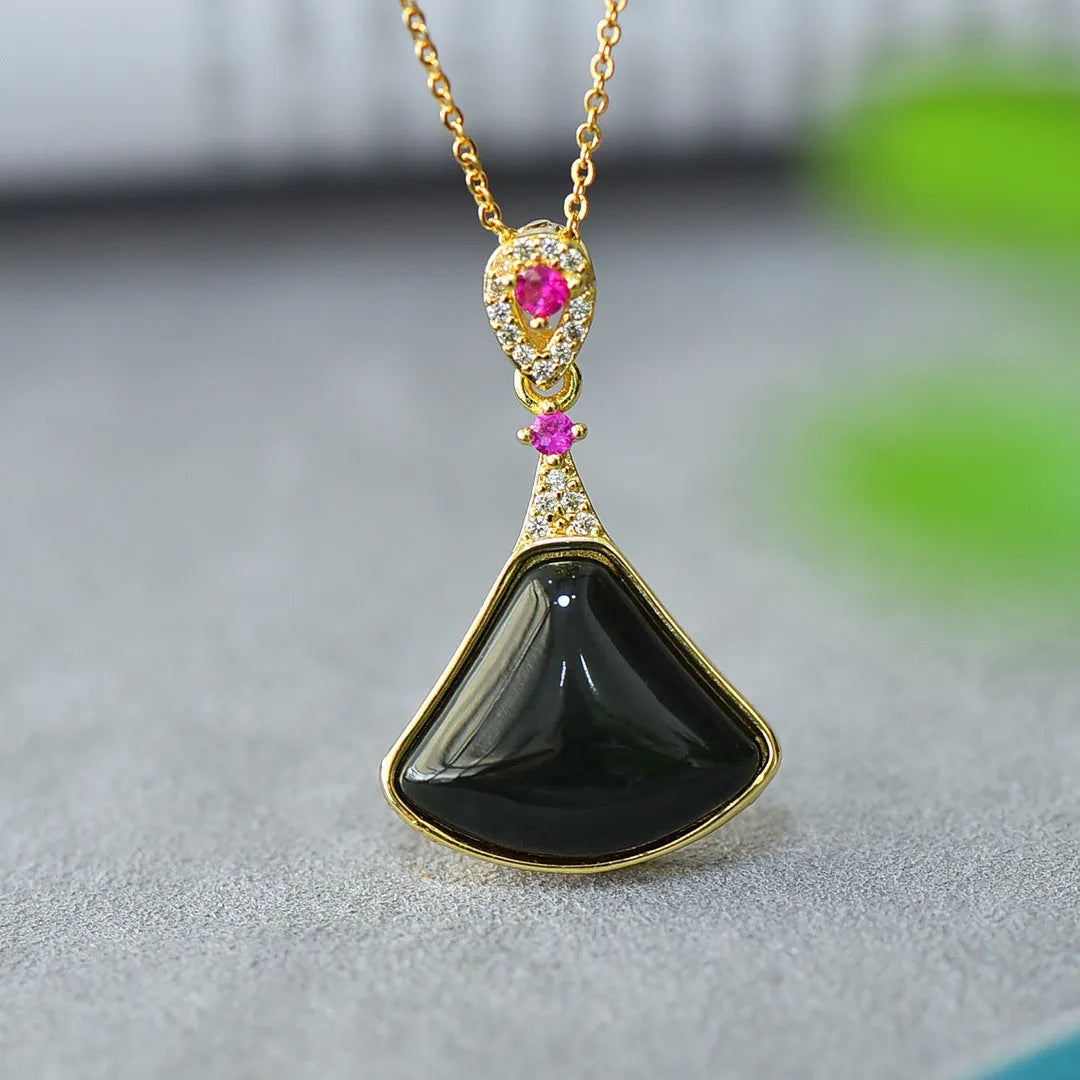 Gray Hetian jade pendant with copper inlay detailing on necklace chain