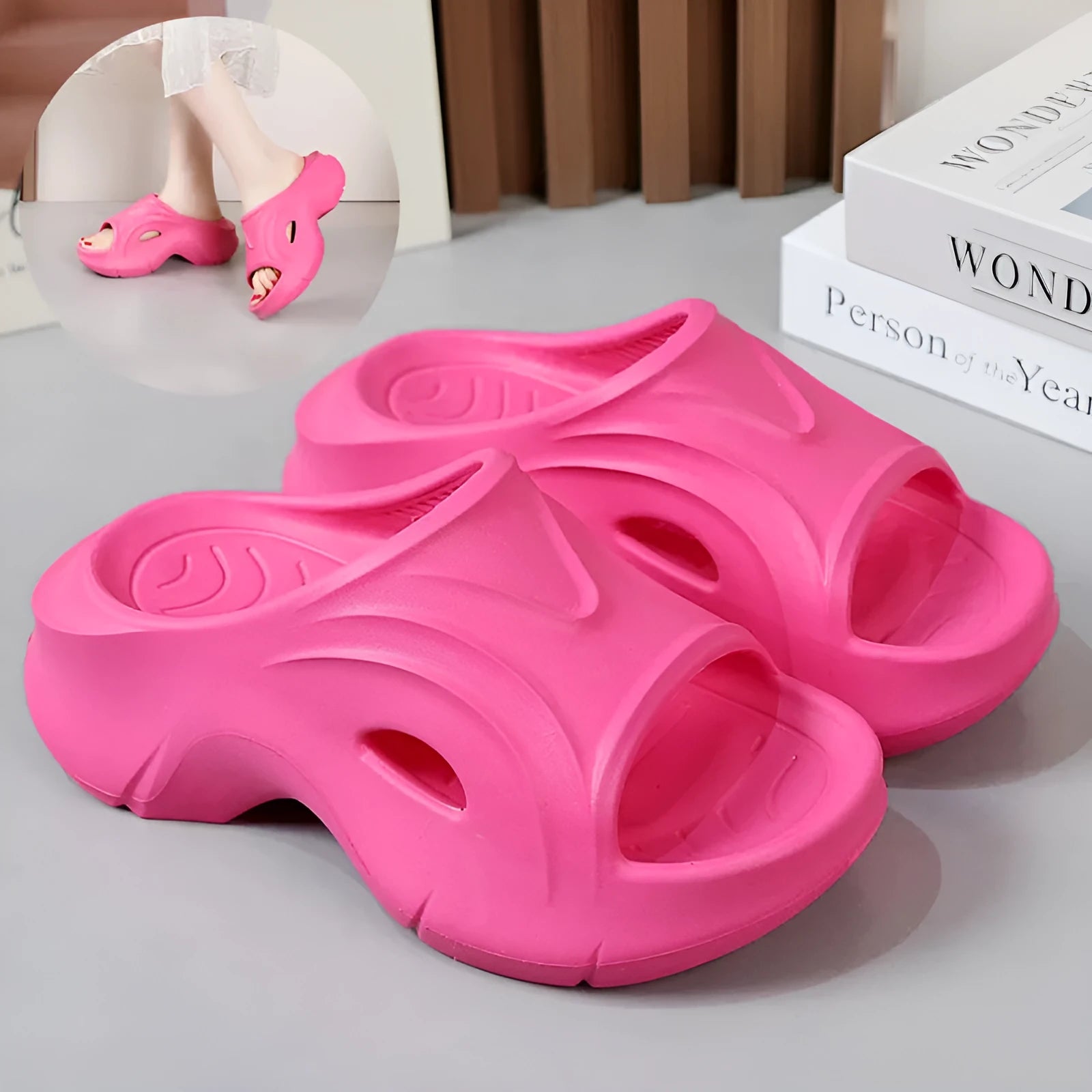 Women's thick-soled EVA slippers in rose red colour showing round toe design