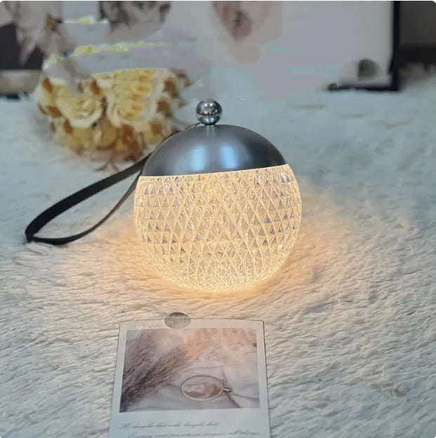 Portable dimmable night lamp with touch control in aluminium and acrylic construction measuring 12cm