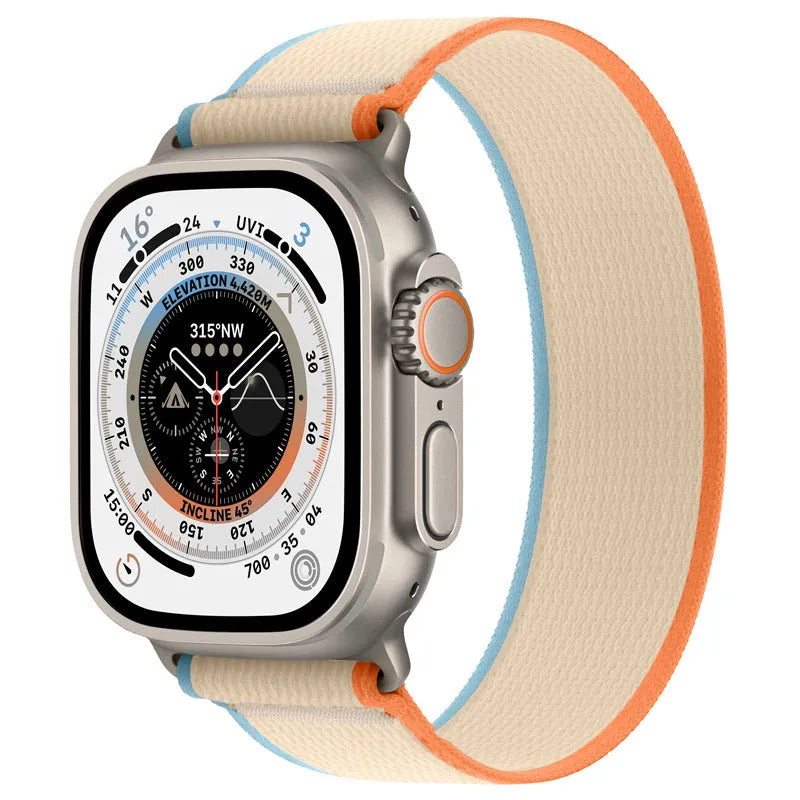 Black nylon Apple Watch band with integrated ring closure on a 44mm watch case.