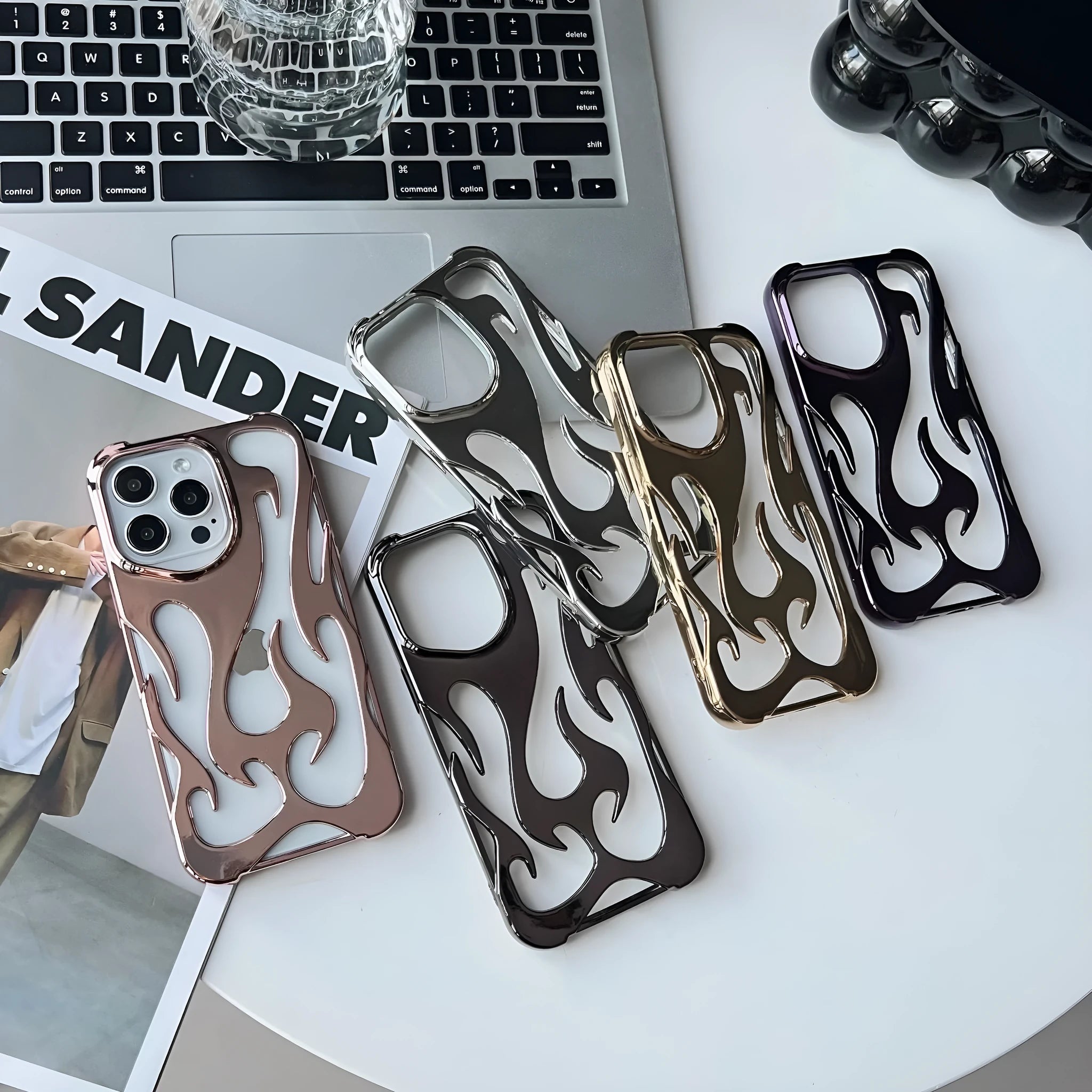 Electroplating hollow flame pattern iPhone case in silver finish on TPU soft shell