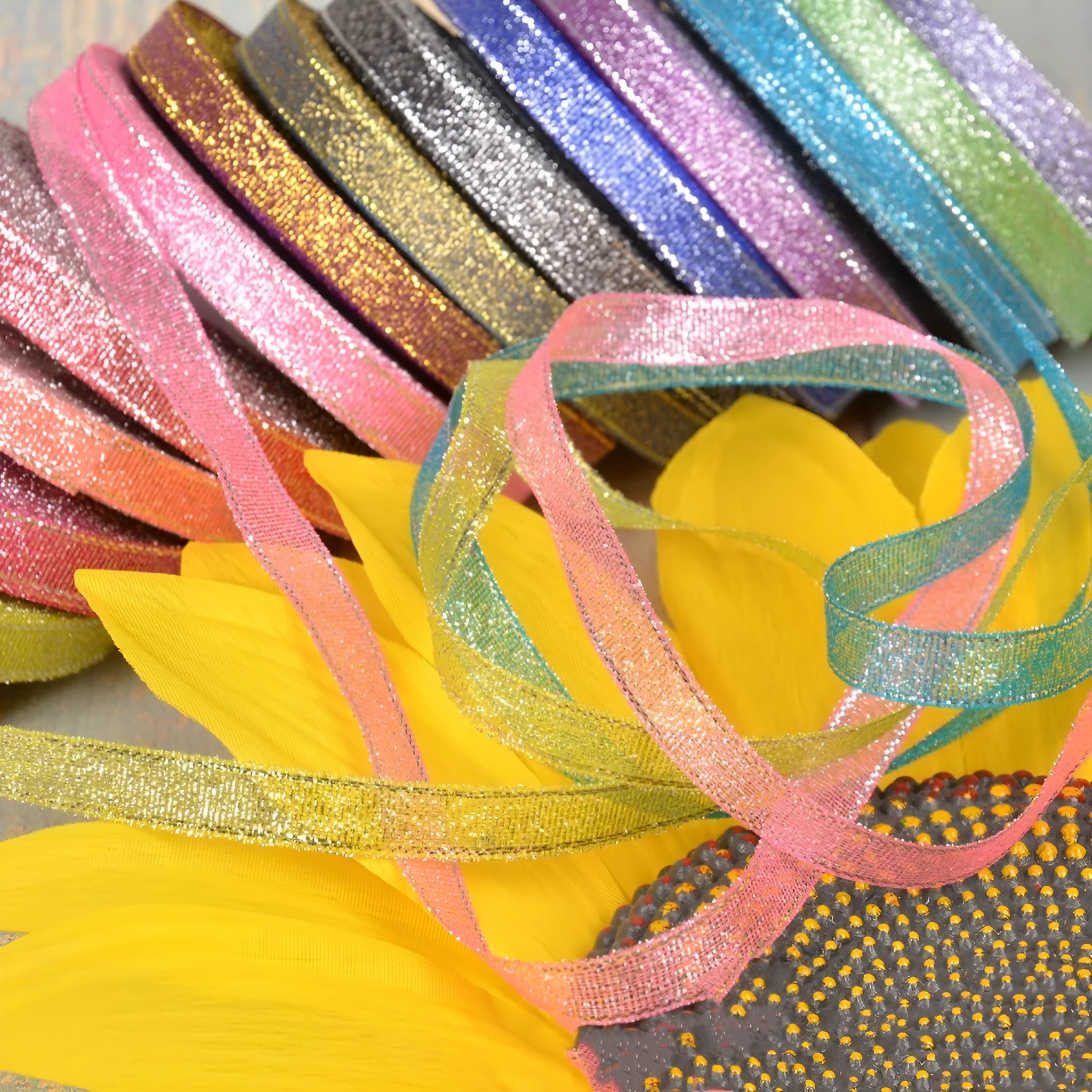 Polyester ribbon spool in metallic colours for decorative clothing and gift packaging trim