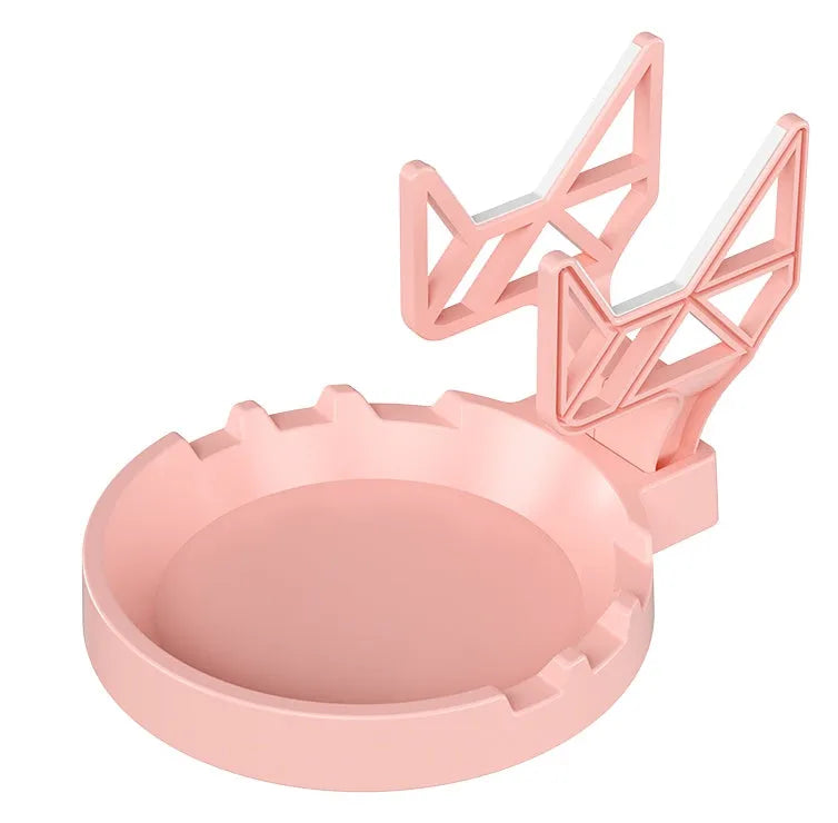 Universal game controller wall hanging rack in black, white, or pink colours with adhesive mounting options