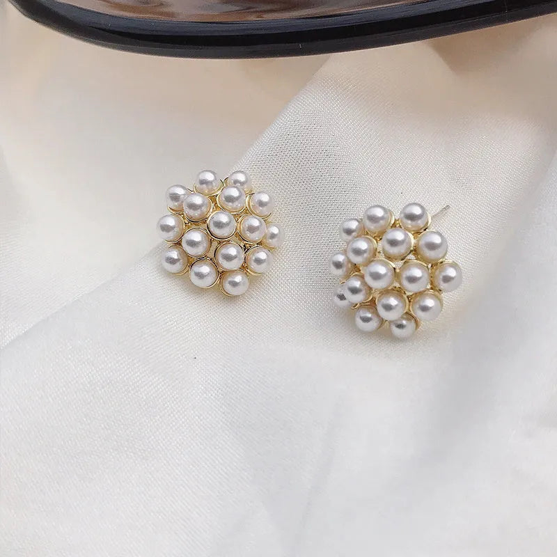 Korean-style gold pineapple starfish pearl alloy earrings with electroplated finish and gem inlay.